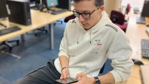 BBC/ Christina McSorley Robert on his phone