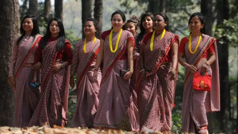 DIPTENDU DUTTA A group of Indian women on their way to West Bengal