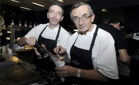 AFP/Getty Images French chef Michel Bras (R) at work with his son, Sebastien Bras