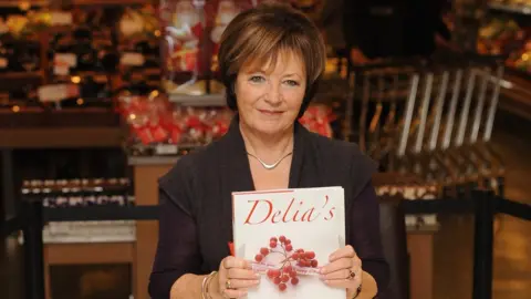 Ian Gavan Delia in 2009 with her cookery book