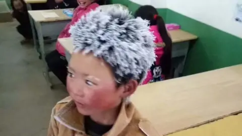 People's Daily Wang, a left-behind migrant child