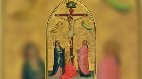 PA Media Undated handout photo issued by Christie's of Fra Angelico's crucifixion painted in the 1420s is the earliest surviving panel painting by the artist. The Crucifixion With the Virgin, Saint John The Evangelist And The Magdalen.