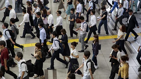 Getty Images The fewer days taken off by Japanese employees in traditional companies, the better standing they have with their managers and coworkers (Credit: Getty Images)