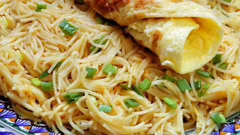 Volodko Marina/Alamy Balaleet is an Emirati omelette served over sweetened vermicelli and eaten for breakfast (Credit: Volodko Marina/Alamy)