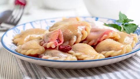 SMarina/Getty Images Sour cherry varenyky (dumplings) are a sweet spin on Ukrainian dumplings (Credit: SMarina/Getty Images)