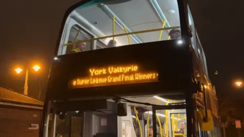 BBC Sport A double decker bus on a dark evening. At the front of the bus it reads: York Valkyrie Super League Grand Final Winners