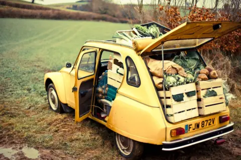 Riverford Organic Farmers Guy first started selling veg from the back of his car to friends in Devon in the 1990s