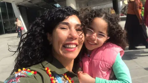 Doaa Gawish Doaa Gawish and her daughter