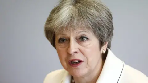 PA Theresa May