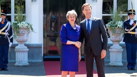 Reuters Theresa May meeting her Dutch counterpart in The Hague