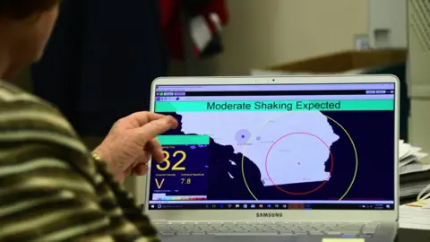 Getty Images A computer screen showing an interface with the ShakeAlert warning system. A message says 'moderate shaking expected'