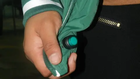 Conacyt A close-up of the button which turns the system on