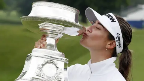 Brian Spurlock-USA TODAY Sports Hannah Green kisses her trophy after winning the KPMG Women"s PGA Championship