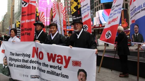 EPA South Koreans protesting against the rising sun flag