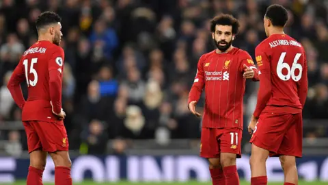 All Sport/Getty Alex Oxlade-Chamberlain, Mo Salah and Trent Alexander-Arnold
