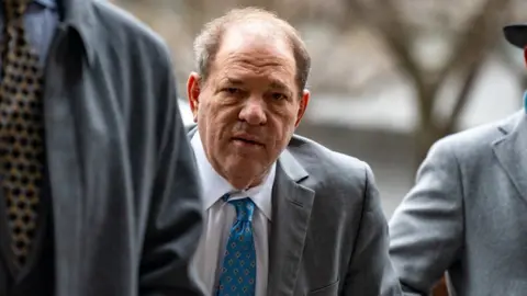 Getty Images Harvey Weinstein arriving at court on 18 February