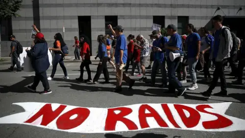 Getty Images Protesters march during a May Day demonstration outside of a US Immigration and Customs Enforcement (ICE) in San Francisco
