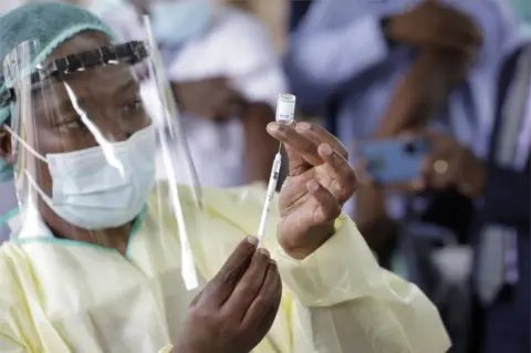 EPA Zimbabwe's Covid vaccinations have got under way