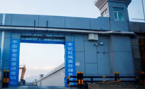 Reuters A gate of what is officially known as a "vocational skills education centre" in Xinjiang