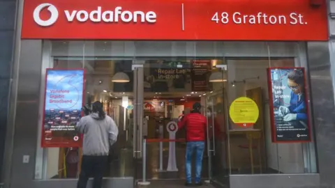 NurPhoto A Vodafone store in Dublin, Ireland