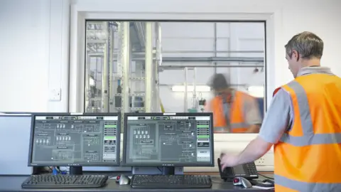 Monty Rakusen Factory workers