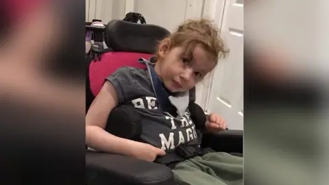 Brian Burridge Charlie sitting upright in her wheelchair in January 2018