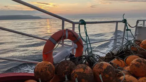 Loughs Agency Sunset at sea