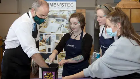 Kevin Cooper/Photoline Taoiseach Micheál Martin participating in "hand casting" as he visits Women'sTec while on a day-long visit to Belfast on 8 October 2021