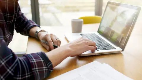 Getty Images Man working from home