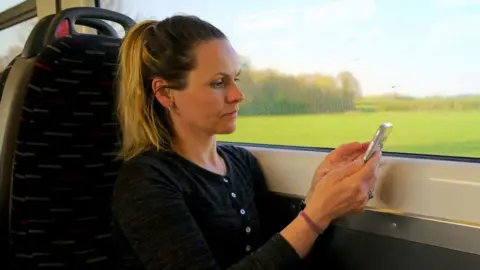 Getty Images Woman on train