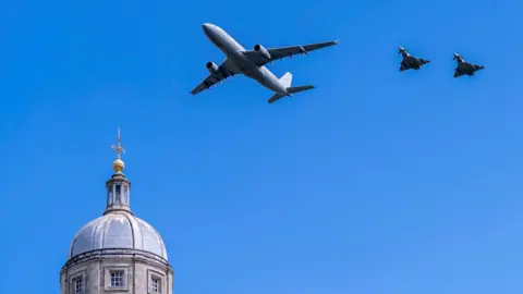 Danny Lawson/Pool via Reuters Fly-past during ceremony