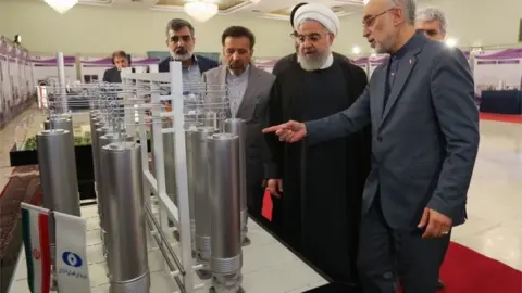 EPA Former Iranian President Hassan Rouhani inspects nuclear technology in Tehran