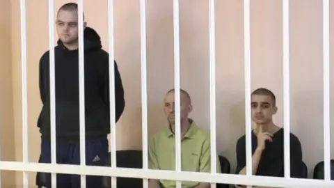 Telegram/@Zvezdanews Aiden Aslin, Shaun Pinner, Saaudun Brahim