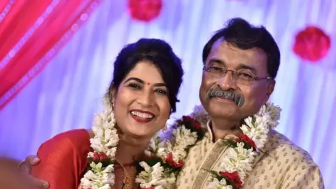 Papri and Arup Chaudhuri