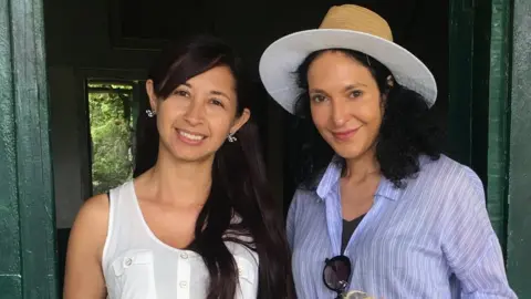 Luisa's Vegan Chocolates Luisa Vicinanza-Bedi and cocoa farmer, Carmen Magali Eraso Adarme