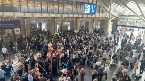 BBC Passengers at King's Cross station