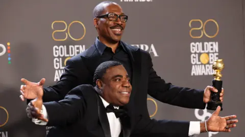 Reuters Tracy Morgan presents Eddie Murphy with the prestigious Cecil B. DeMille Award
