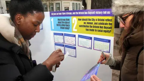 Race for Power People adding their opinions to a ballot box