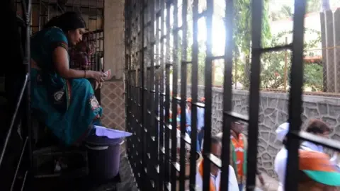 AFP A quarter of Indian men are engaged in unpaid chores, compared to four-fifths of women