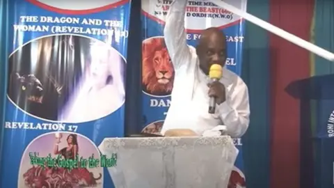 YOUTUBE Screenshot of Pastor Mackenzie delivering a sermon