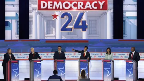 Getty Images The candidates on stage at the first debate in Wisconsin