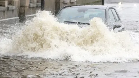 PA Media Car flood