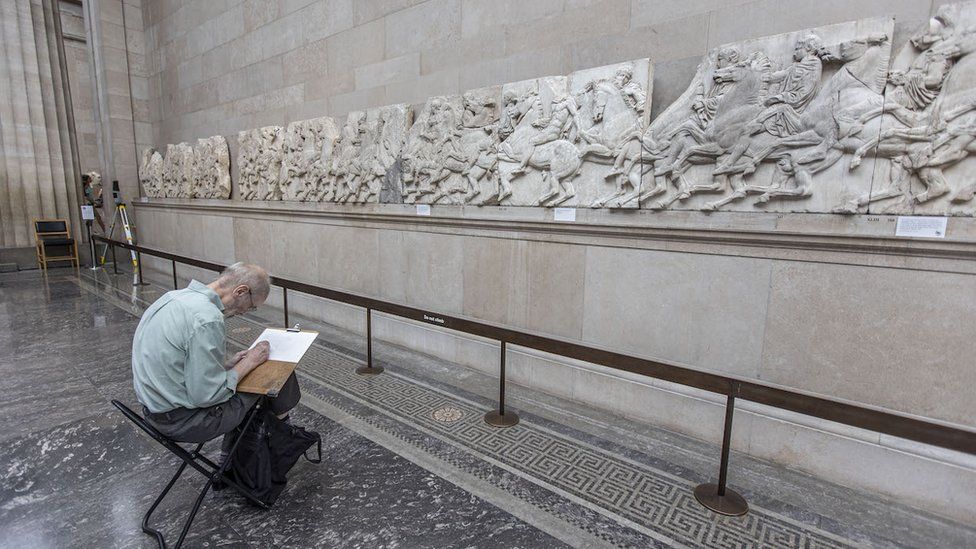 Man sketching the Parthenon Sculptures in the British Museum
