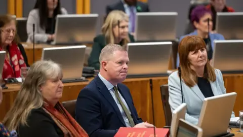 Welsh government Julie James, Jeremy Miles and Lesley Griffiths