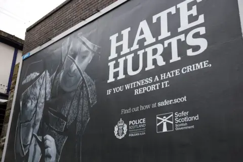 Getty Images A billboard detailing the new hate crime legislation in Glasgow