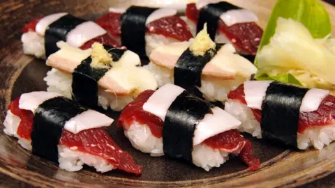 AFP Whale sushi made with sliced minke meats and blubber, at a sushi shop