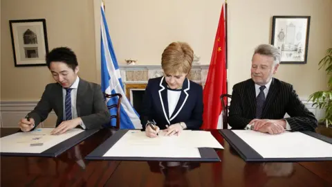 Sinofortone Nicola Sturgeon signing deal