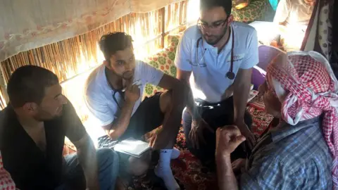 Haroon Ali/ ABMU Health Board The doctors at the camp