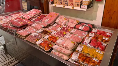 BBC/Luke Knight A counter full of pre-packed meat