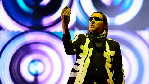 Win Butler, the lead singer of Arcade Fire, films himself with an iPhone at the 2014 Glastonbury Festival. (Leon Neal/AFP/Getty Images)